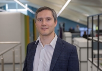Headshot of Oly Longland, Sustainability Reporting Manager.