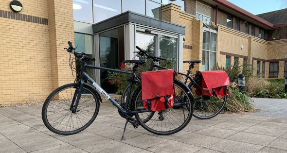 Image of pool bikes outside a building